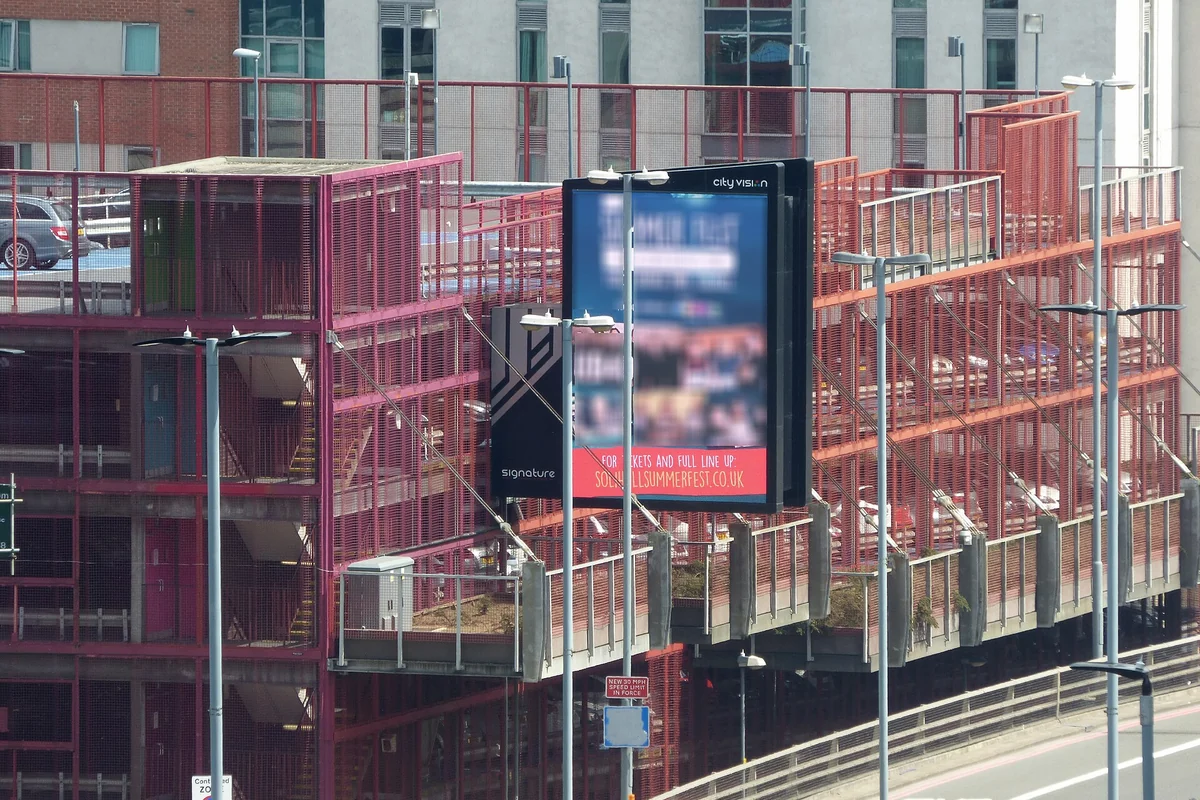 Window-facing and outdoor advertising display brightness guide